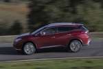Picture of a driving 2017 Nissan Murano in Cayenne Red Metallic from a side perspective