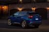 Picture of a 2019 Nissan Murano Platinum AWD in Deep Blue Pearl from a rear left three-quarter perspective