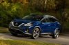 Picture of a driving 2019 Nissan Murano Platinum AWD in Deep Blue Pearl from a front left perspective