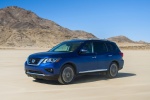 Picture of a driving 2018 Nissan Pathfinder Platinum 4WD in Caspian Blue from a front left three-quarter perspective