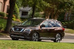 Picture of a driving 2019 Nissan Pathfinder Platinum 4WD in Mocha Almond Pearl from a front left three-quarter perspective
