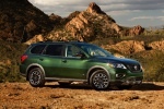 Picture of a 2019 Nissan Pathfinder SL Rock Creek Edition 4WD in Midnight Pine Metallic from a front right three-quarter perspective