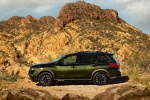 Picture of a 2019 Nissan Pathfinder SL Rock Creek Edition 4WD in Midnight Pine Metallic from a left side perspective