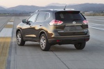 Picture of a 2015 Nissan Rogue SL AWD in Super Black from a rear left perspective