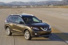 Picture of a 2016 Nissan Rogue SL AWD in Magnetic Black from a front right three-quarter perspective