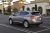 Picture of a 2014 Nissan Rogue Select in Platinum Graphite from a rear left three-quarter perspective