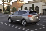 Picture of a 2015 Nissan Rogue Select in Platinum Graphite from a rear left three-quarter perspective
