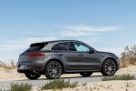 Picture of a 2015 Porsche Macan Turbo in Agate Gray Metallic from a rear right three-quarter perspective