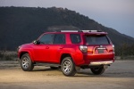 Picture of a 2018 Toyota 4Runner TRD Off Road in Barcelona Red Metallic from a rear left three-quarter perspective