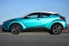 Picture of a 2018 Toyota C-HR in Radiant Green Mica from a side perspective