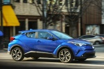 Picture of a driving 2018 Toyota C-HR in Blue Eclipse Metallic from a front right three-quarter perspective