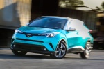 Picture of a driving 2018 Toyota C-HR in Radiant Green Mica from a front left perspective