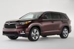 Picture of a 2014 Toyota Highlander Limited AWD in Ooh La La Rouge Mica from a front left three-quarter perspective
