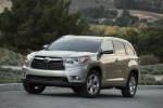 Picture of a 2014 Toyota Highlander Limited in Creme Brulee Mica from a front left three-quarter perspective