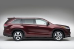 Picture of a 2014 Toyota Highlander Limited AWD in Ooh La La Rouge Mica from a side perspective