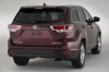 Picture of a 2015 Toyota Highlander Limited AWD in Ooh La La Rouge Mica from a rear right perspective