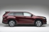 Picture of a 2015 Toyota Highlander Limited AWD in Ooh La La Rouge Mica from a side perspective
