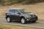Picture of a driving 2014 Toyota RAV4 Limited in Magnetic Gray Pearl from a front right three-quarter perspective