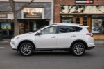 Picture of a driving 2016 Toyota RAV4 Limited AWD in Super White from a left side perspective