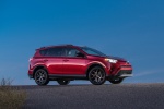 Picture of a driving 2016 Toyota RAV4 SE AWD in Barcelona Red from a front right three-quarter perspective