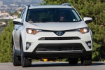 Picture of a driving 2016 Toyota RAV4 Limited AWD in Super White from a front right perspective