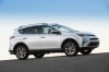 Picture of a driving 2017 Toyota RAV4 Limited AWD in Super White from a right side perspective