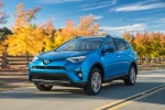 Picture of a driving 2017 Toyota RAV4 Hybrid Limited AWD in Electric Storm Blue from a front left three-quarter perspective