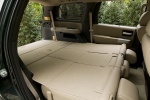 Picture of a 2016 Toyota Sequoia's Third Row Seats Folded in Sand Beige