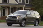 Picture of a 2016 Toyota Sequoia in Pyrite Mica from a front left three-quarter perspective