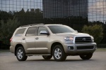 Picture of a 2016 Toyota Sequoia in Sandy Beach Metallic from a front right three-quarter perspective