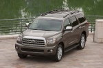 Picture of a 2016 Toyota Sequoia in Pyrite Mica from a front left three-quarter top perspective