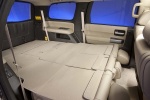 Picture of a 2016 Toyota Sequoia's Third Row Seats Folded in Sand Beige