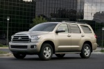 Picture of a 2016 Toyota Sequoia in Sandy Beach Metallic from a front left perspective