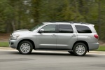 Picture of a driving 2016 Toyota Sequoia in Silver Sky Metallic from a left side perspective