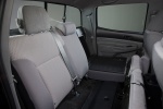 Picture of a 2014 Toyota Tacoma Double Cab SR5 V6 4WD's Rear Seats Folded in Graphite