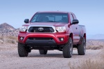 Picture of a 2014 Toyota Tacoma Access Cab V6 4WD in Barcelona Red Metallic from a front left perspective