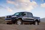 Picture of a 2014 Toyota Tacoma Double Cab SR5 V6 4WD in Blue Ribbon Metallic from a front left three-quarter perspective