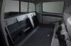 Picture of a 2015 Toyota Tacoma Double Cab SR5 V6 4WD's Rear Seats Folded in Graphite
