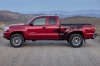 Picture of a 2015 Toyota Tacoma Access Cab V6 4WD in Barcelona Red Metallic from a side perspective
