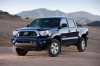 Picture of a 2015 Toyota Tacoma Double Cab SR5 V6 4WD in Blue Ribbon Metallic from a front left perspective